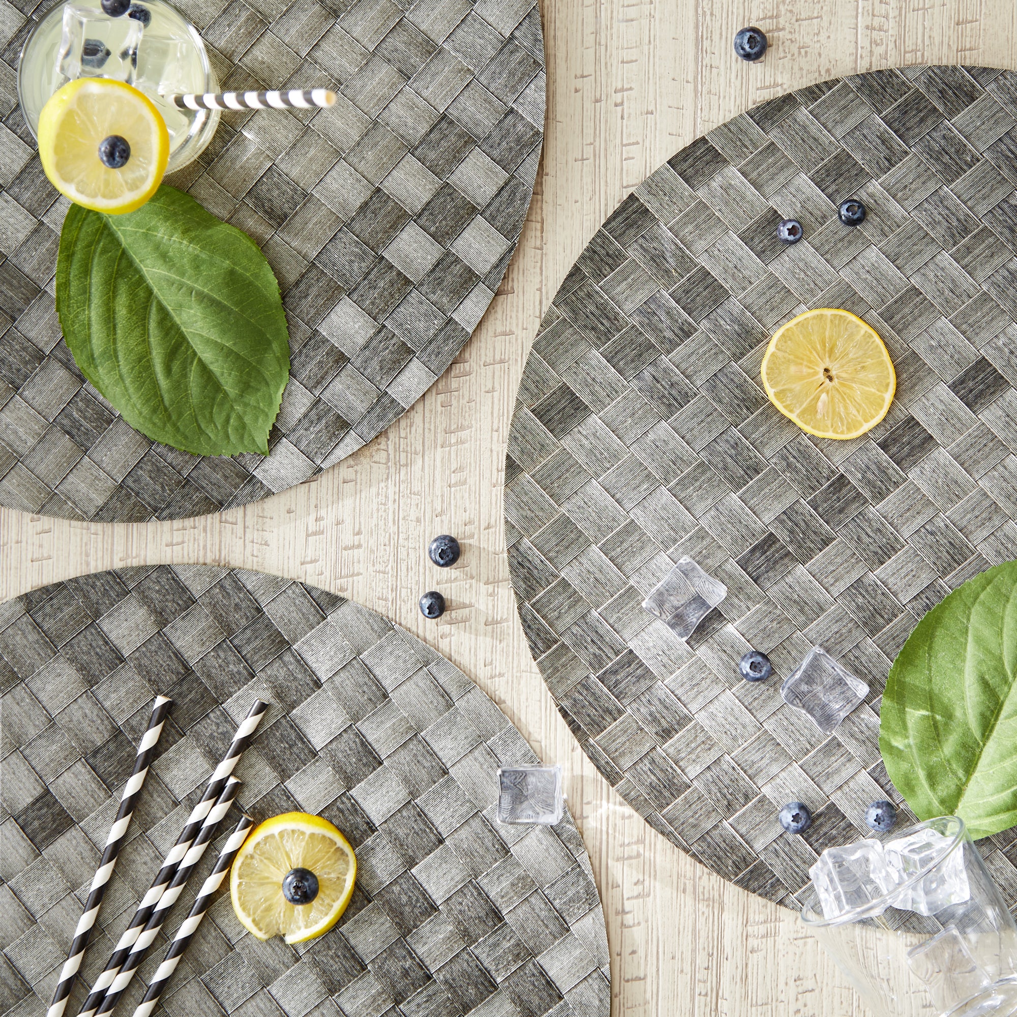 DII Basketweave Round Woven Polyethylene Placemat 4-Piece Set