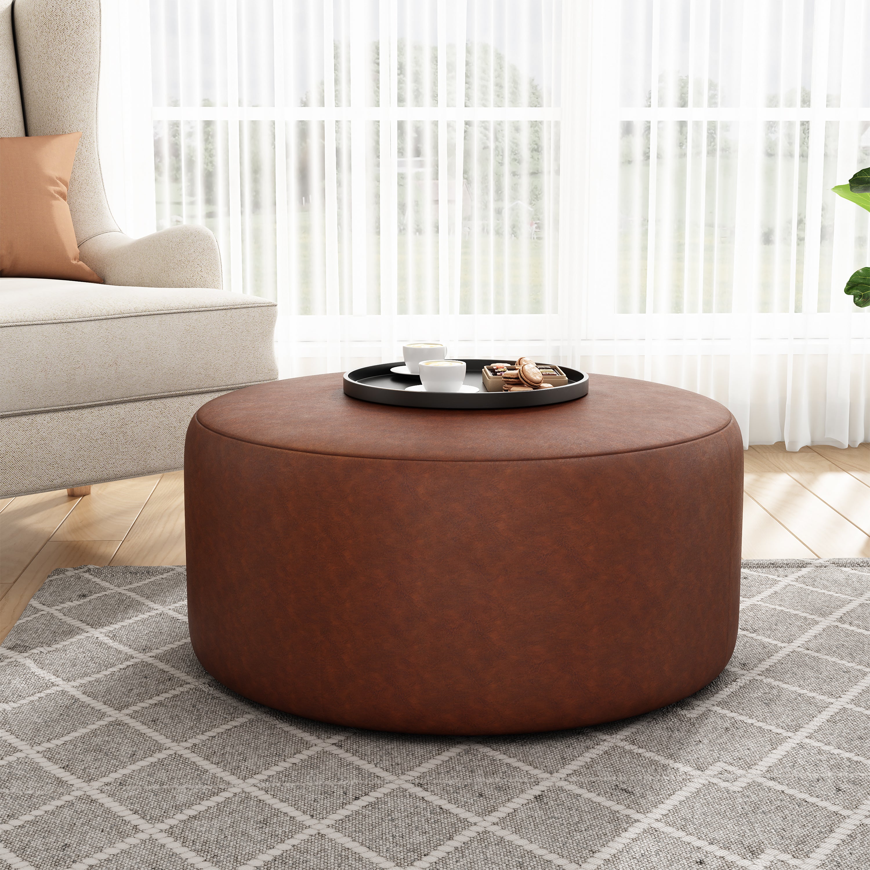 Upholstered Round Vegan Leather Ottoman