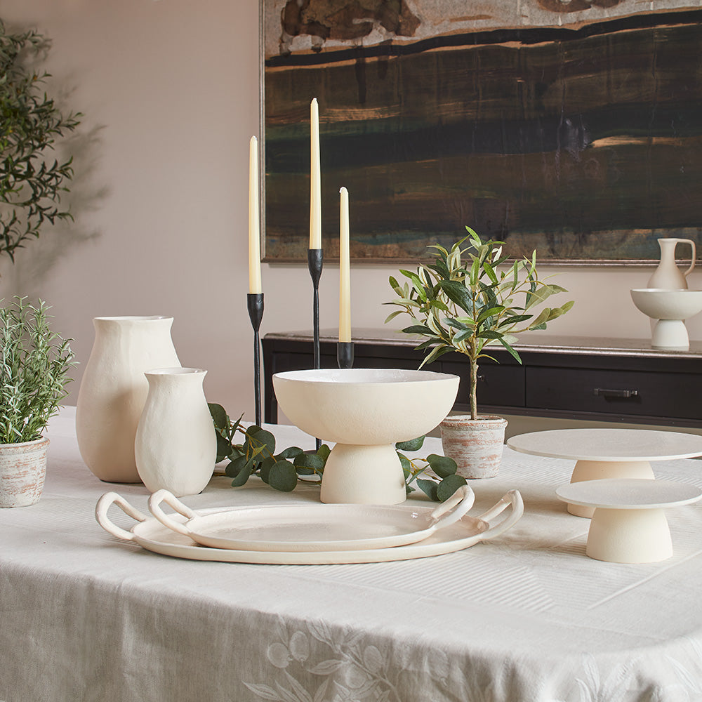 Creme Serving Trays with matching pichers and cake stands with food