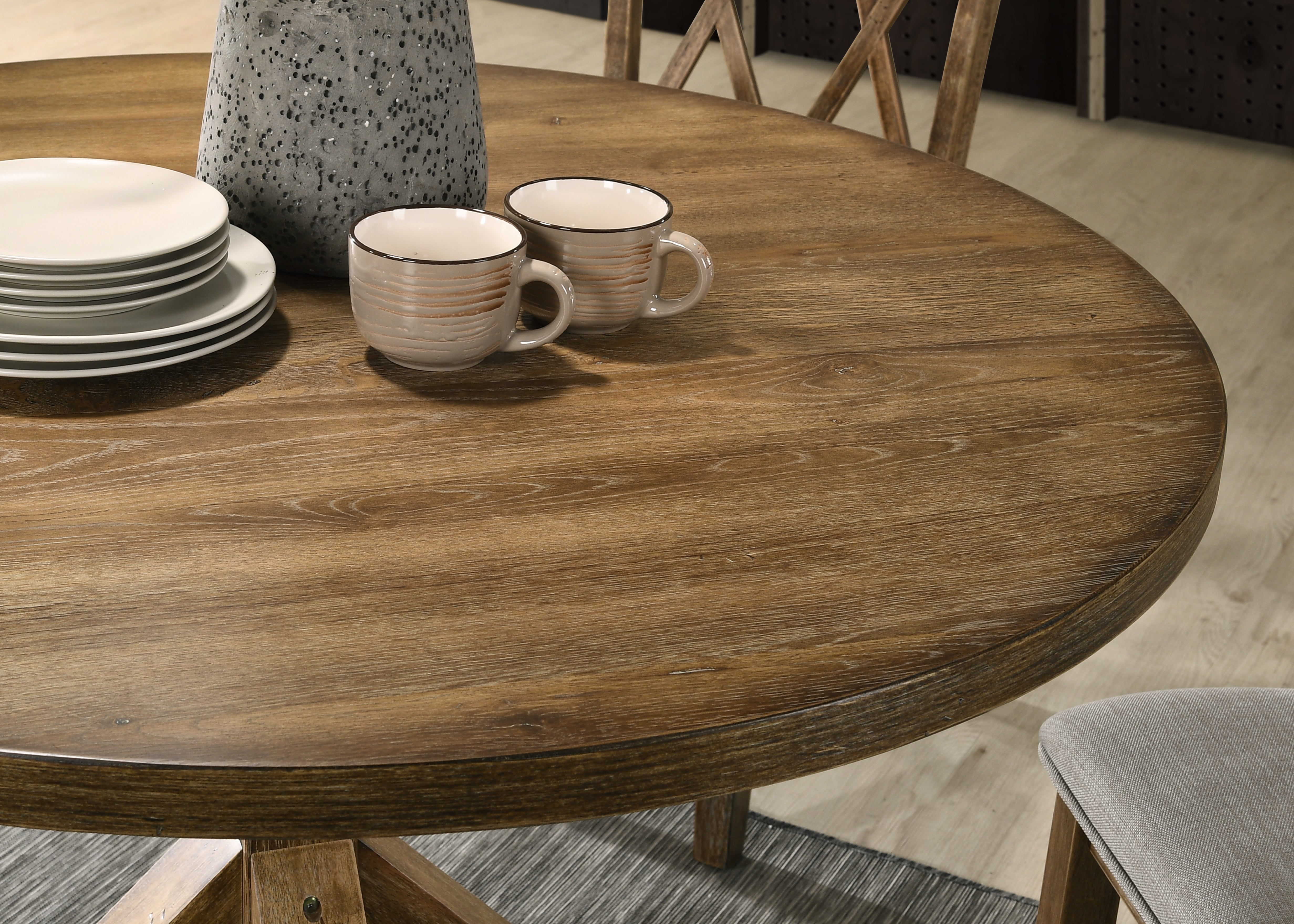 Firlo Round Dining Table with Cross-Buck Pedestal Base