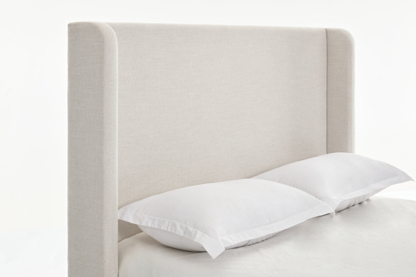 Hayden Upholstered Wingback Bed