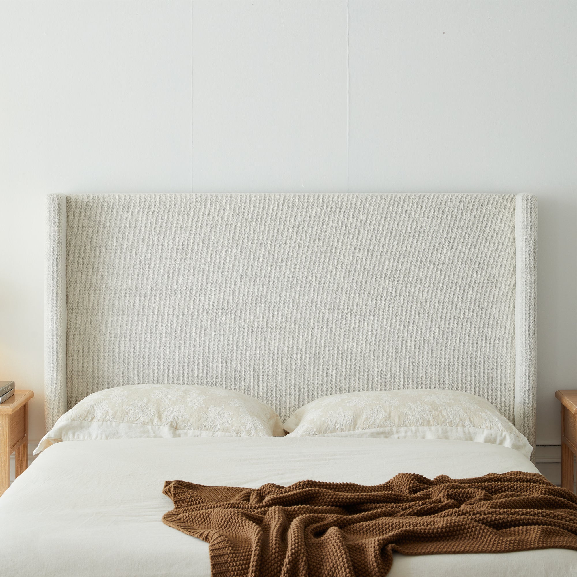 Hosford Upholstered Wingback Bed