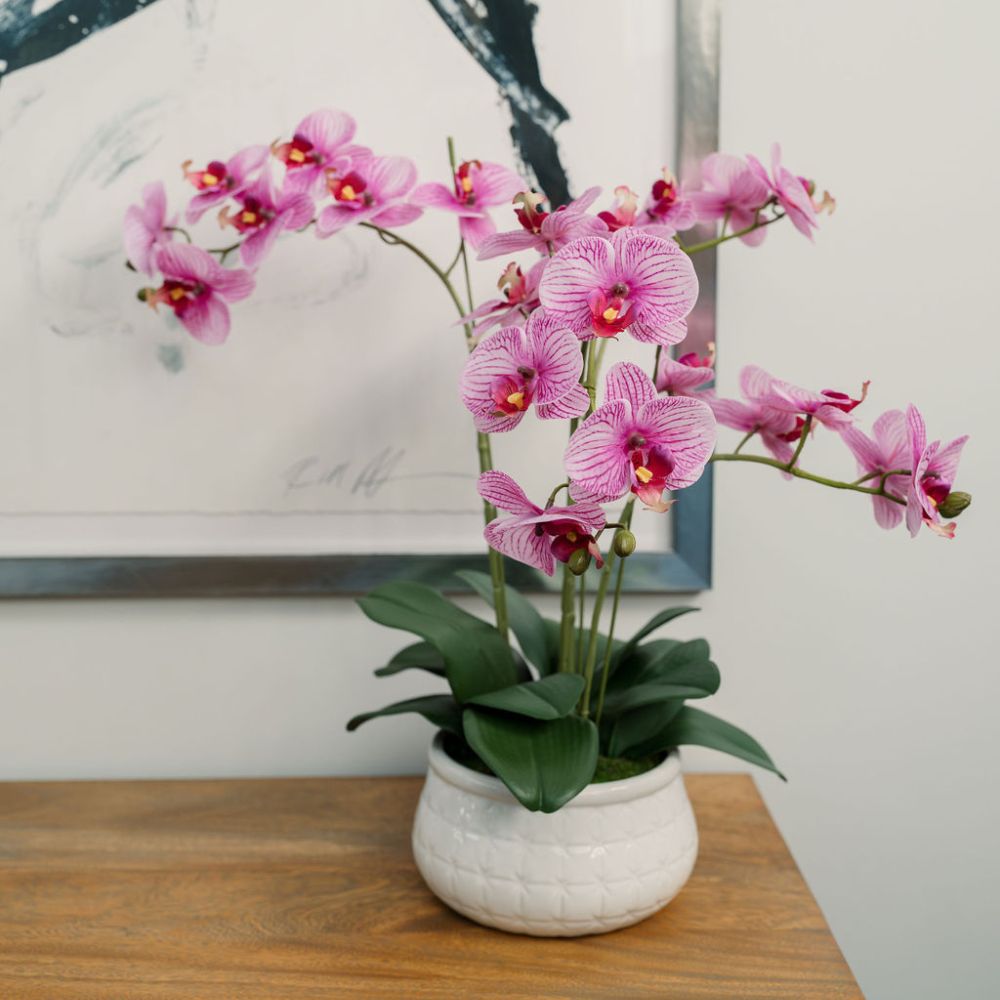 23" Faux Orchid Arrangement in Purple - Lifelike Phalaenopsis in White Ceramic Pot