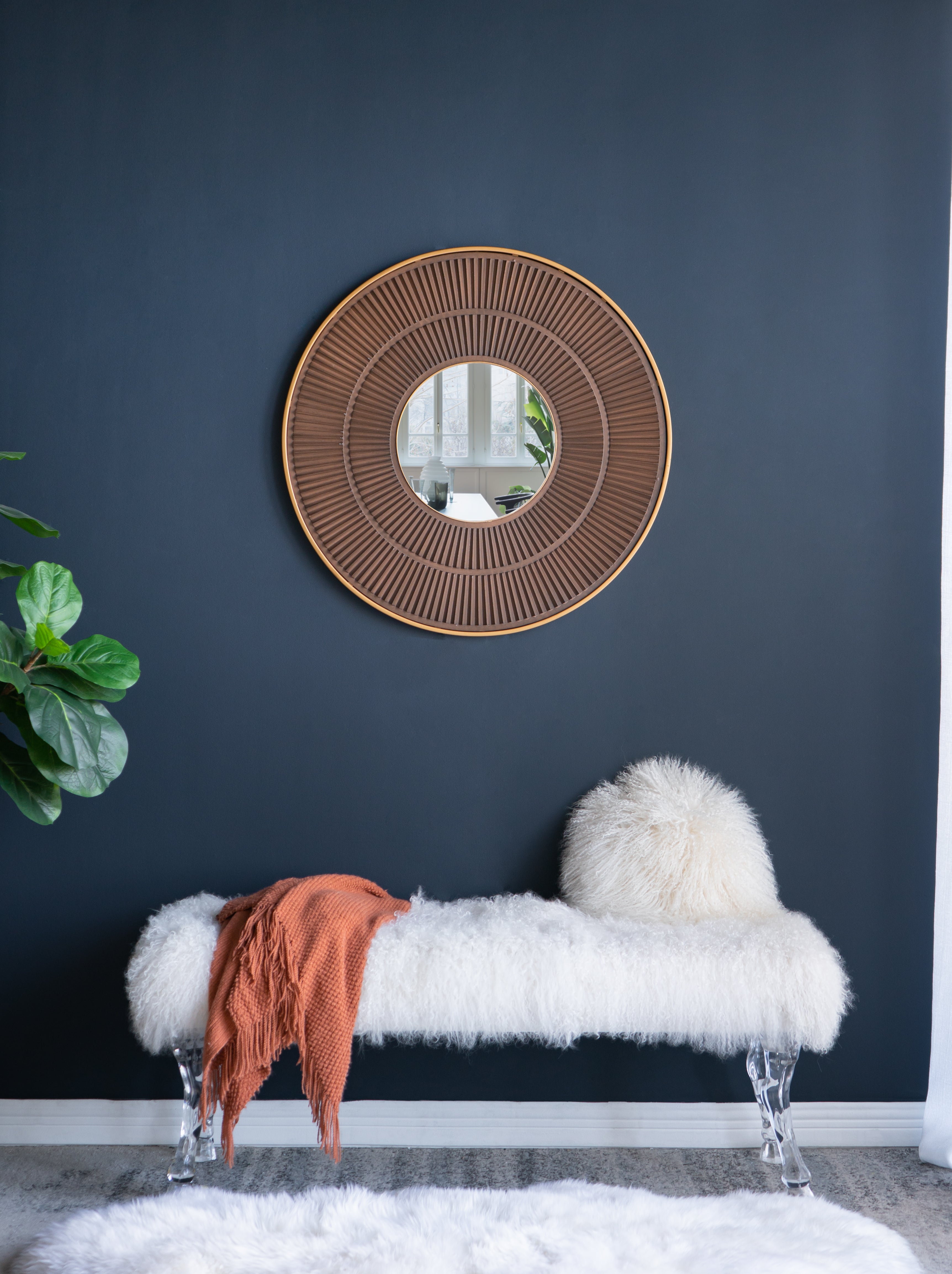 Round Wall Mirror with Pleated Design and Iron Frame