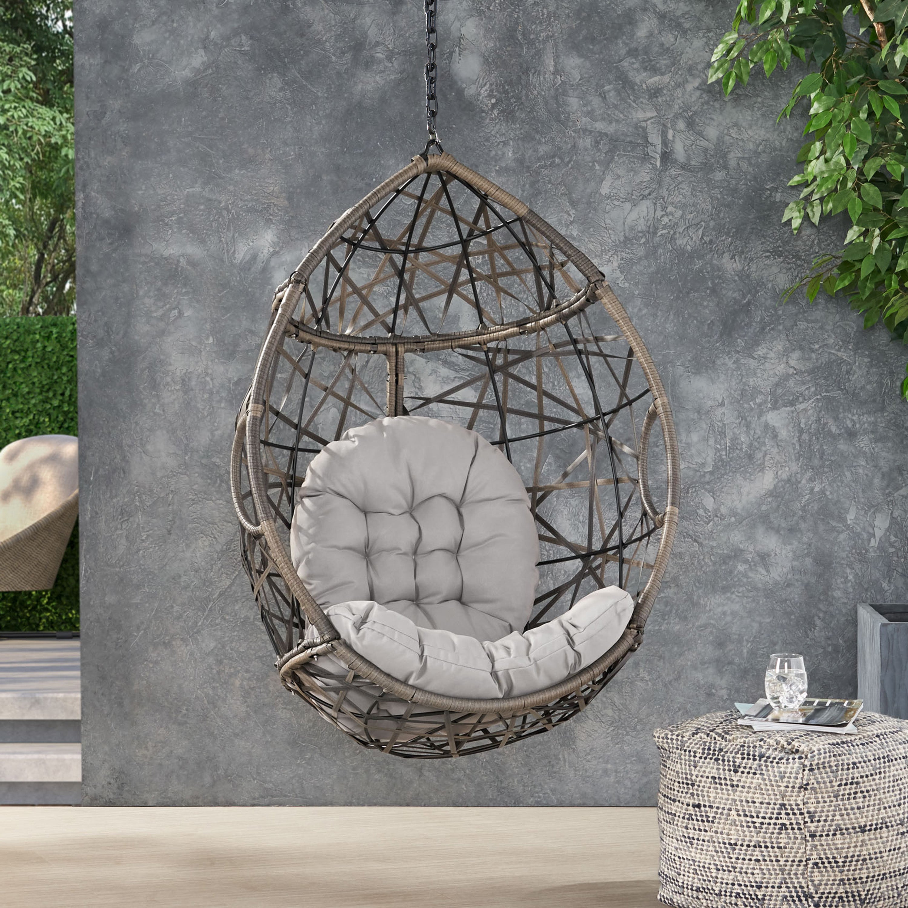 Hanging Chair with Tufted Cushion and Teardrop Shape