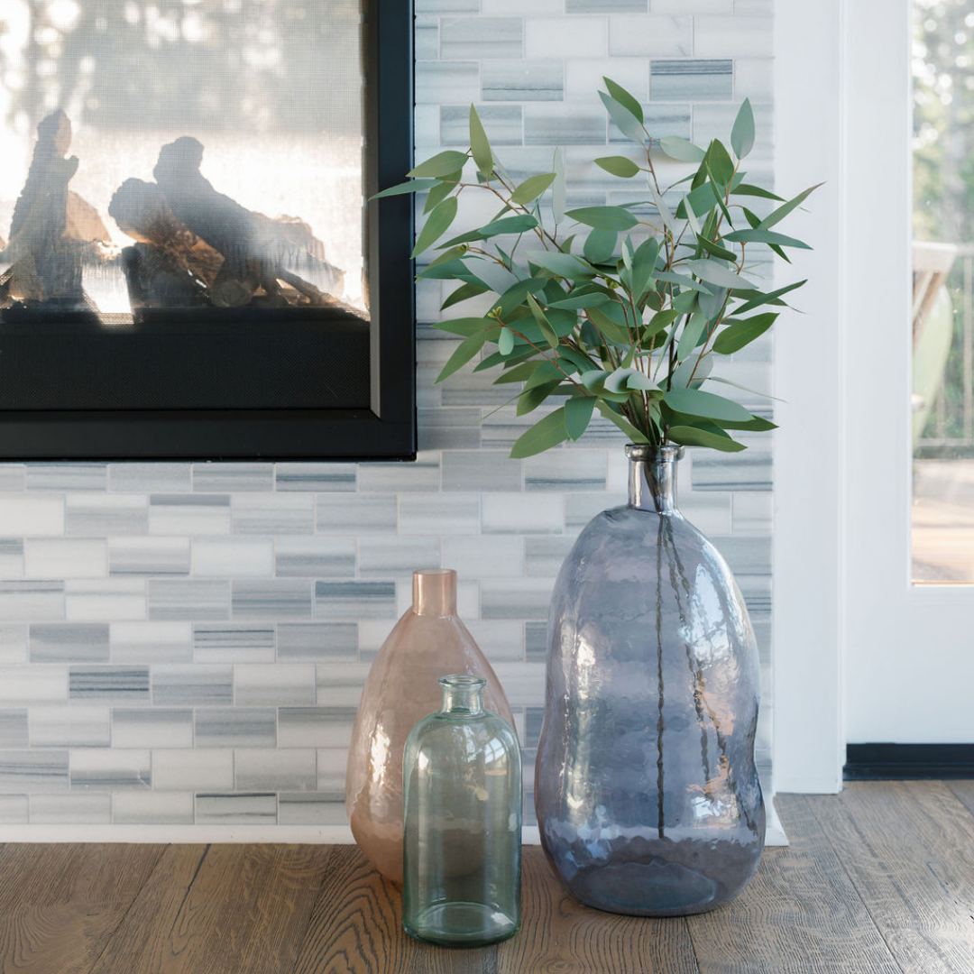Hammered Vase Set in Front of Fireplaced