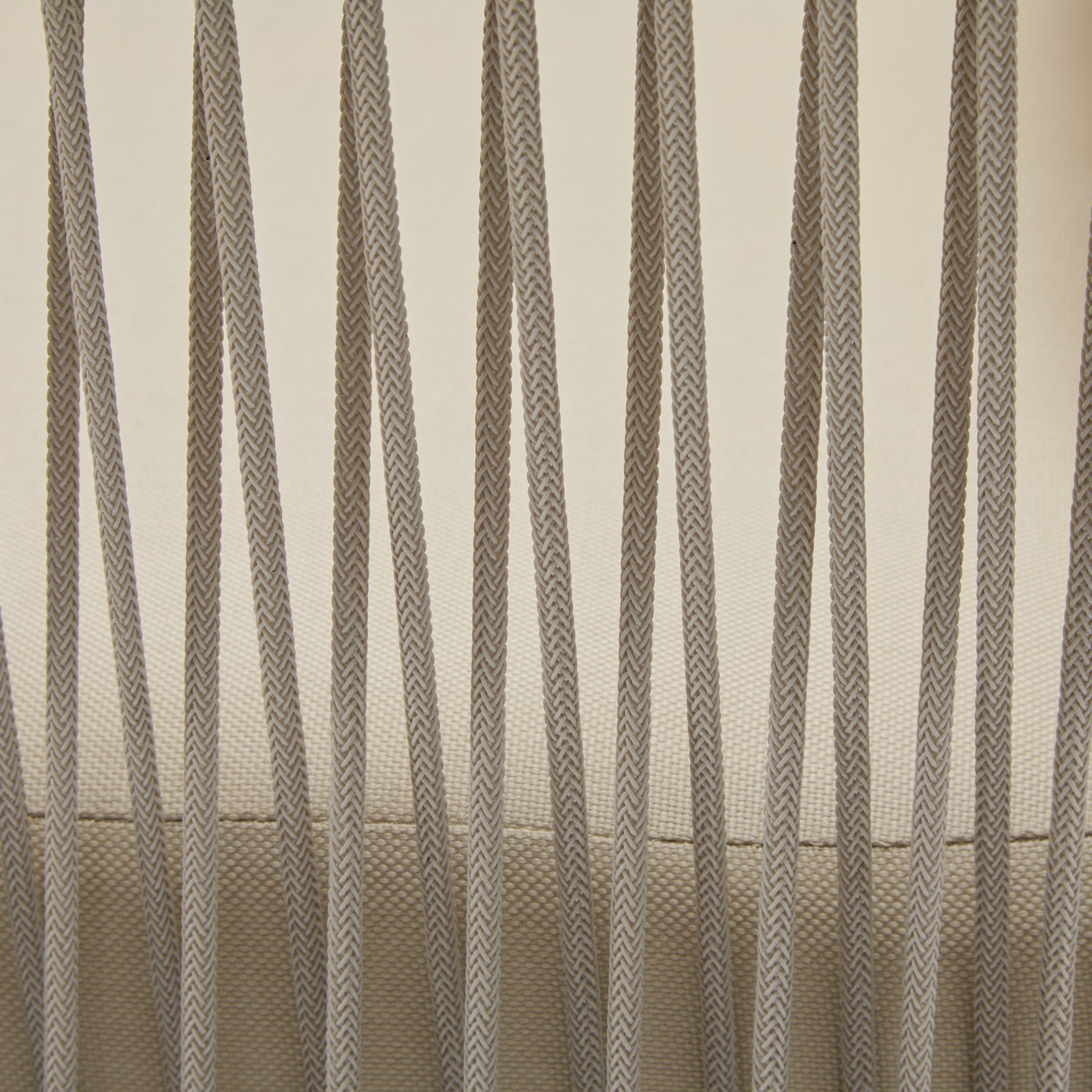 Modern Beige Curved Aluminum Lounge Chair with Stylish Rope-Weave Design and Cushioned Comfort