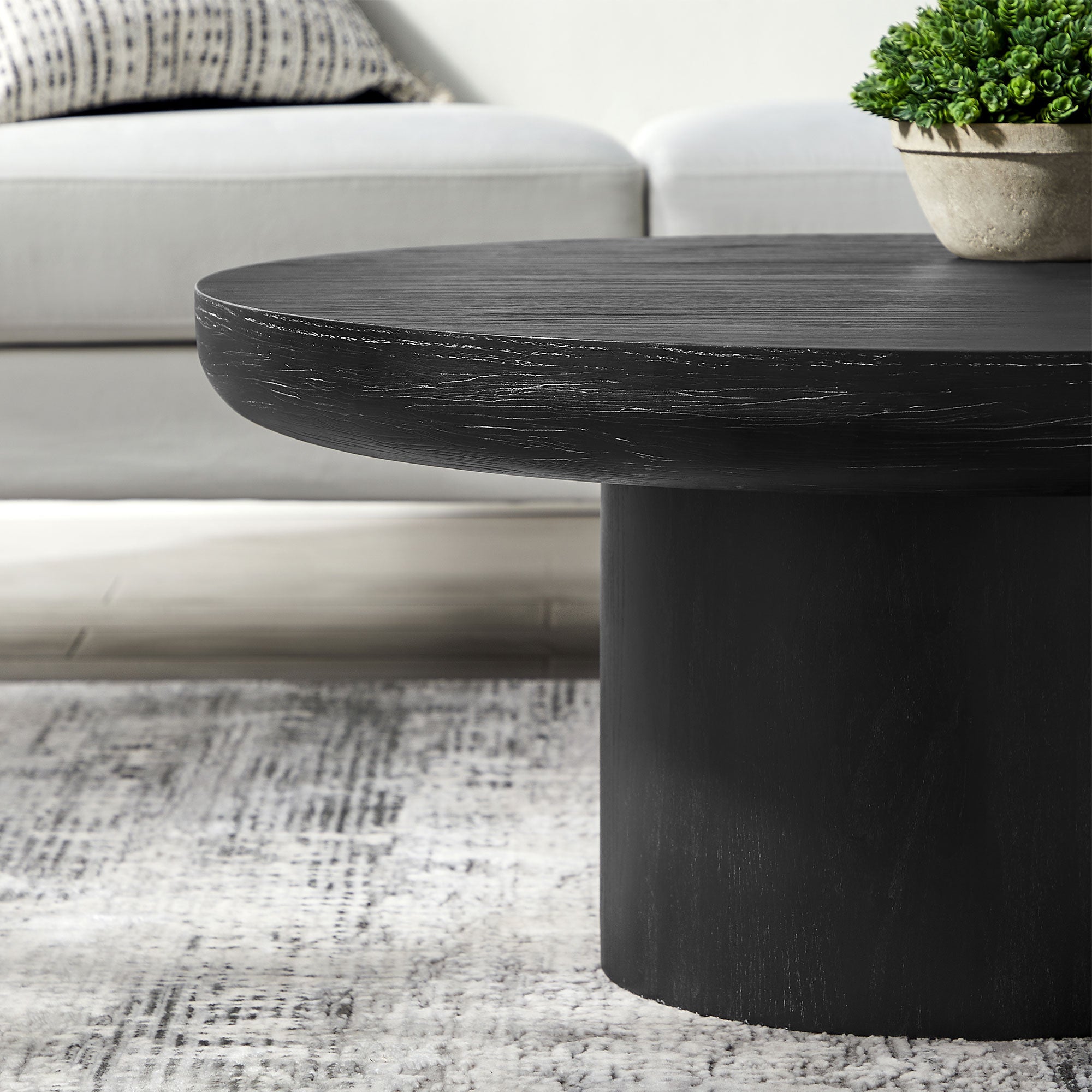 Round Pedestal Coffee Table