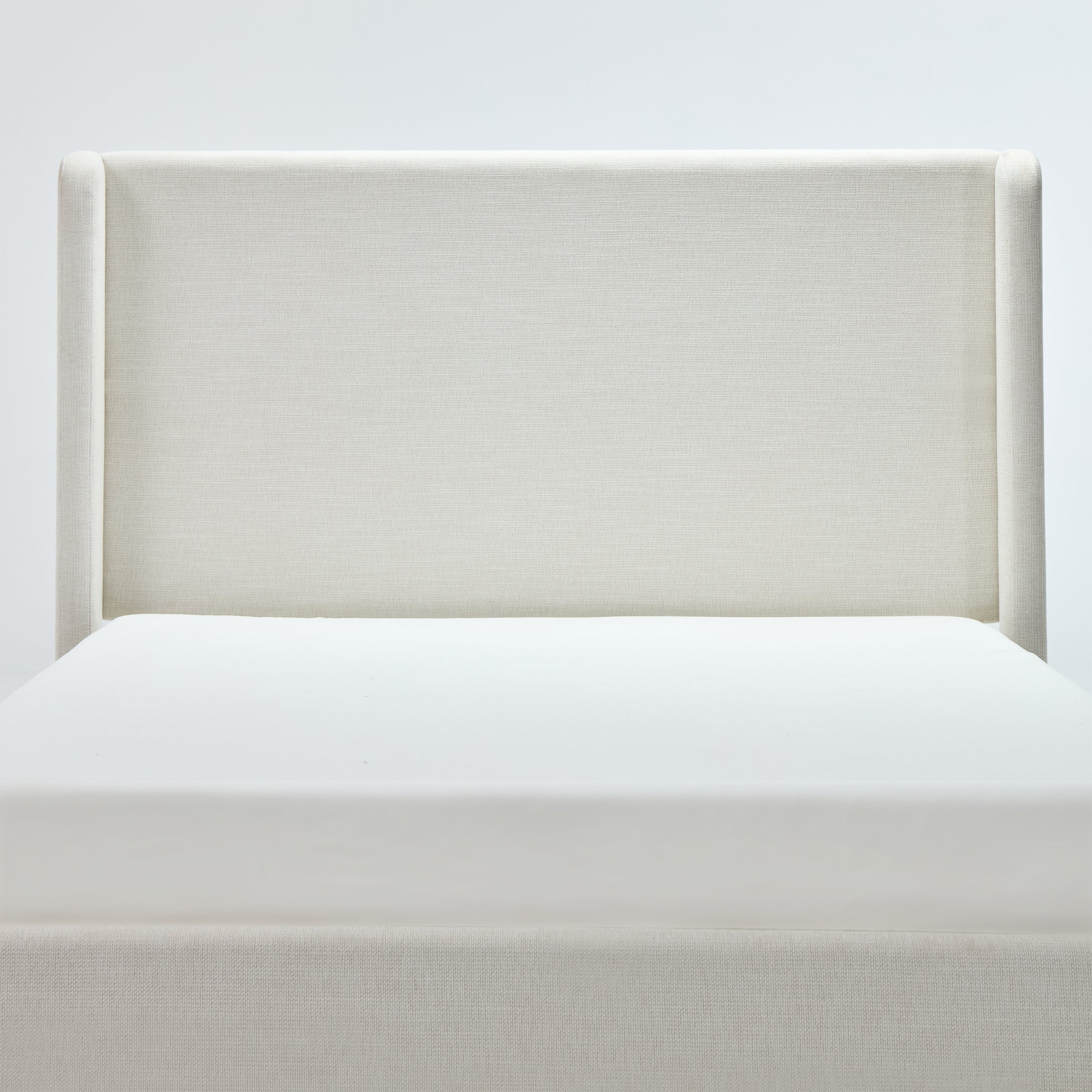 Carmen Upholstered Wingback Bed