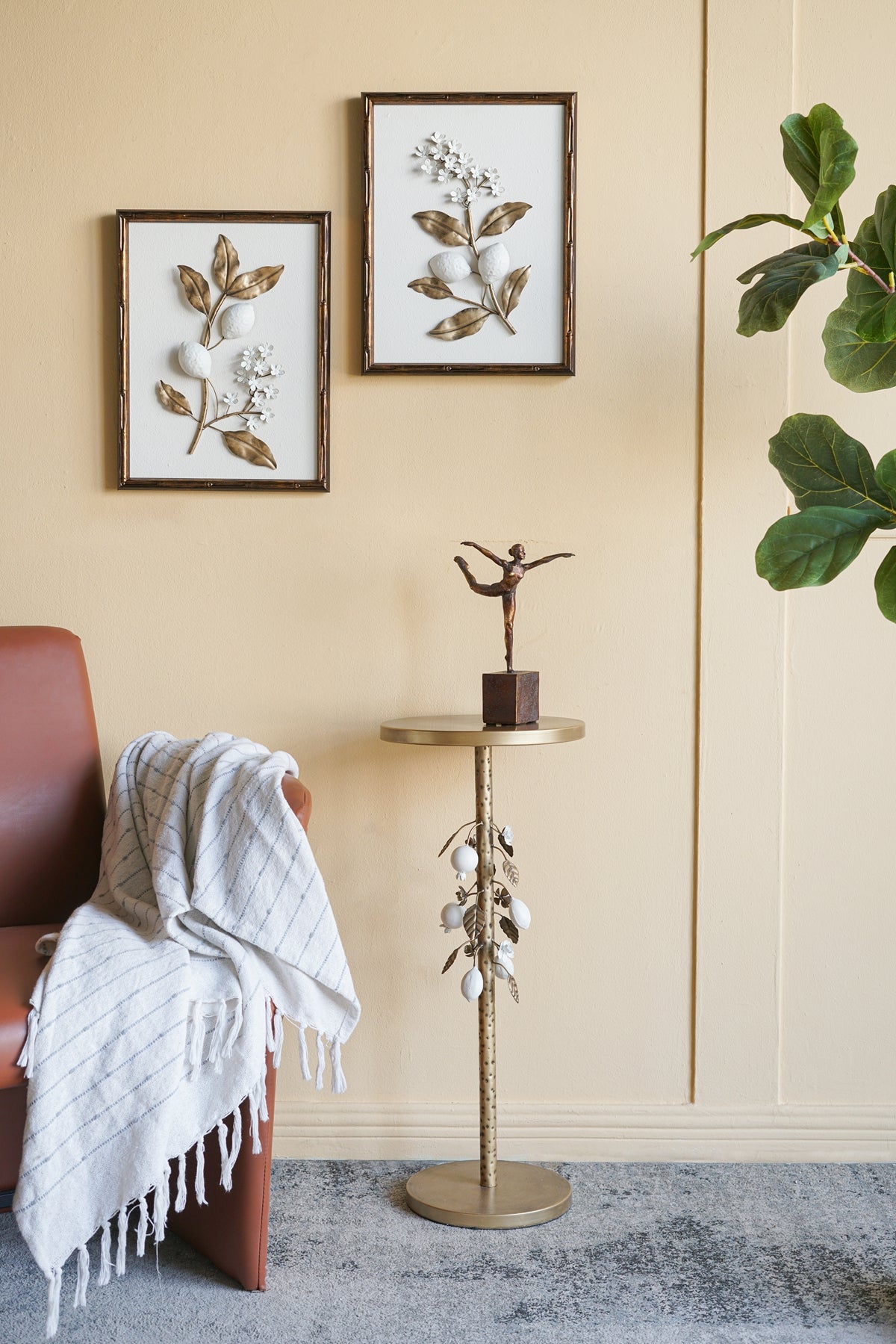 Round Iron Side Table with Gold and White Floral Accents and Cement Base