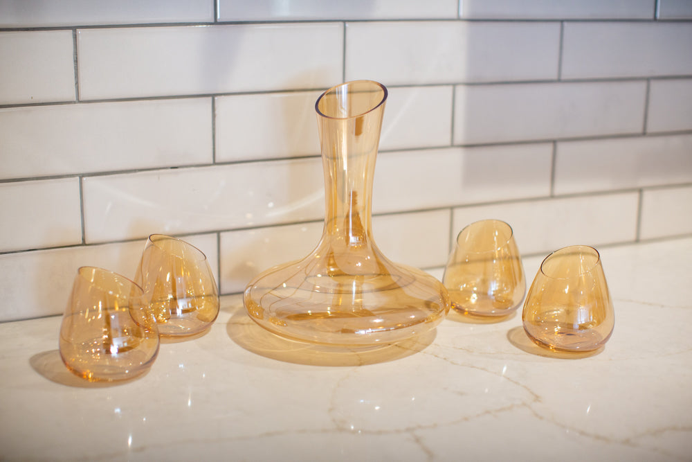 Wine Decanter and Set of Four Stemless Wine Glasses, Gold