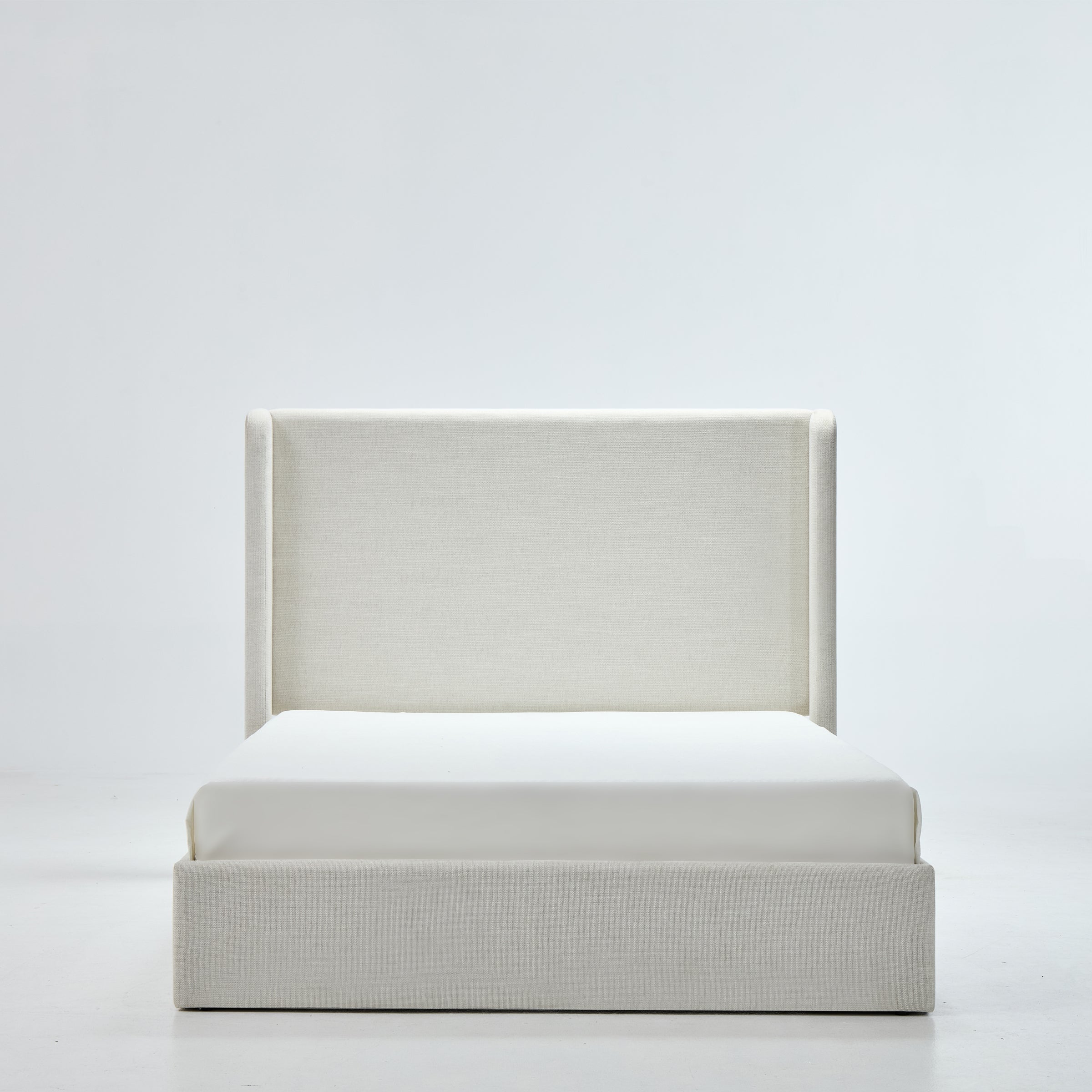 Caron Upholstered Wingback Bed