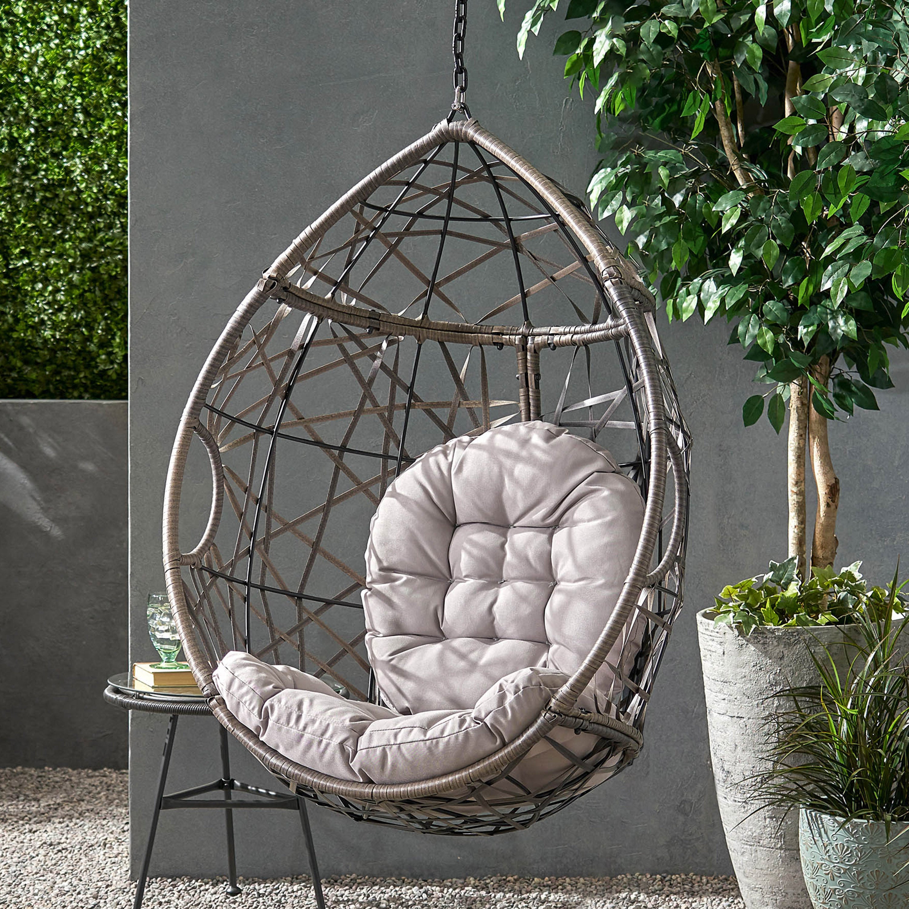 Hanging Chair with Tufted Cushion and Teardrop Shape
