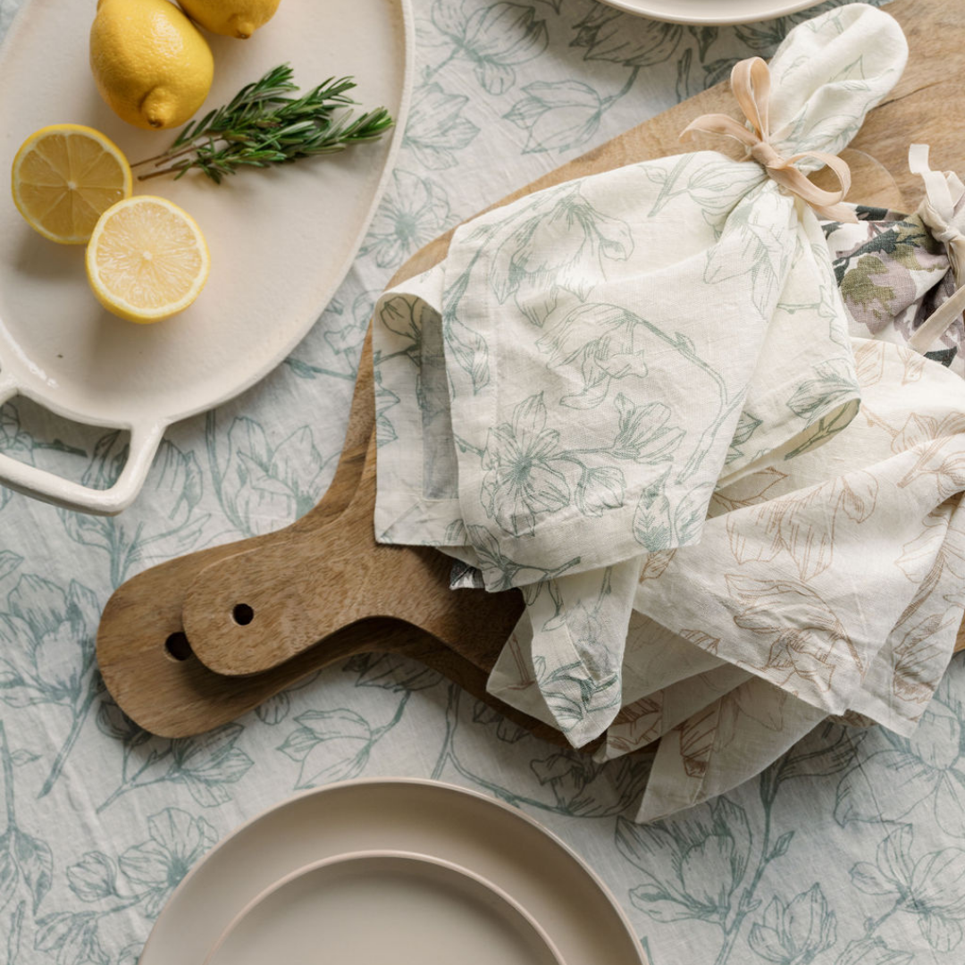 Blue and white floral linen napkin on matching spring tablescape