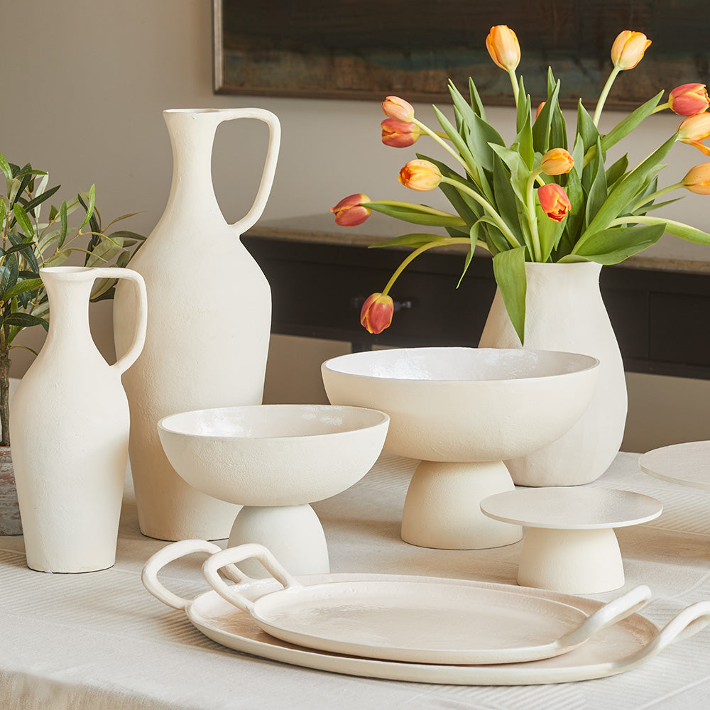 Creme vase with green branch