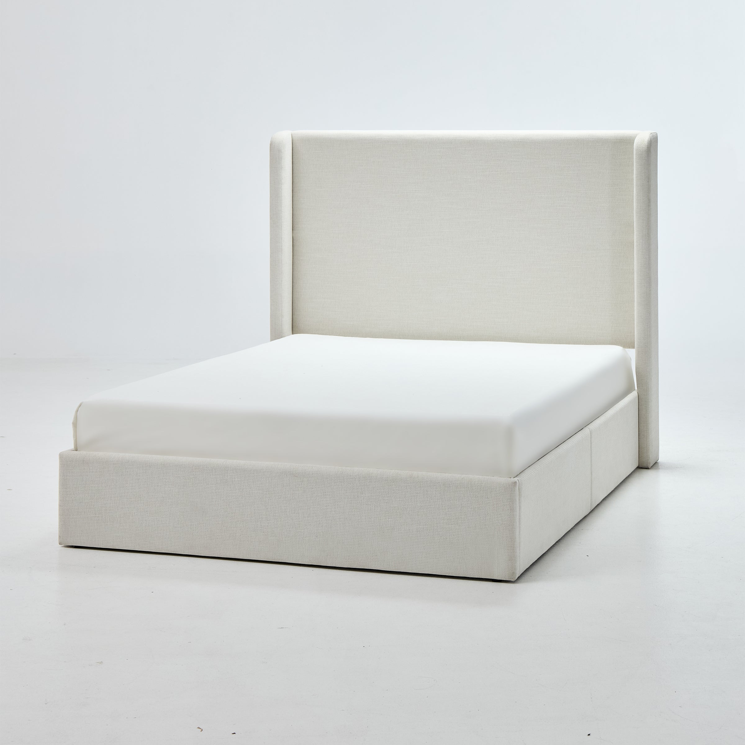 Carmen Upholstered Wingback Bed
