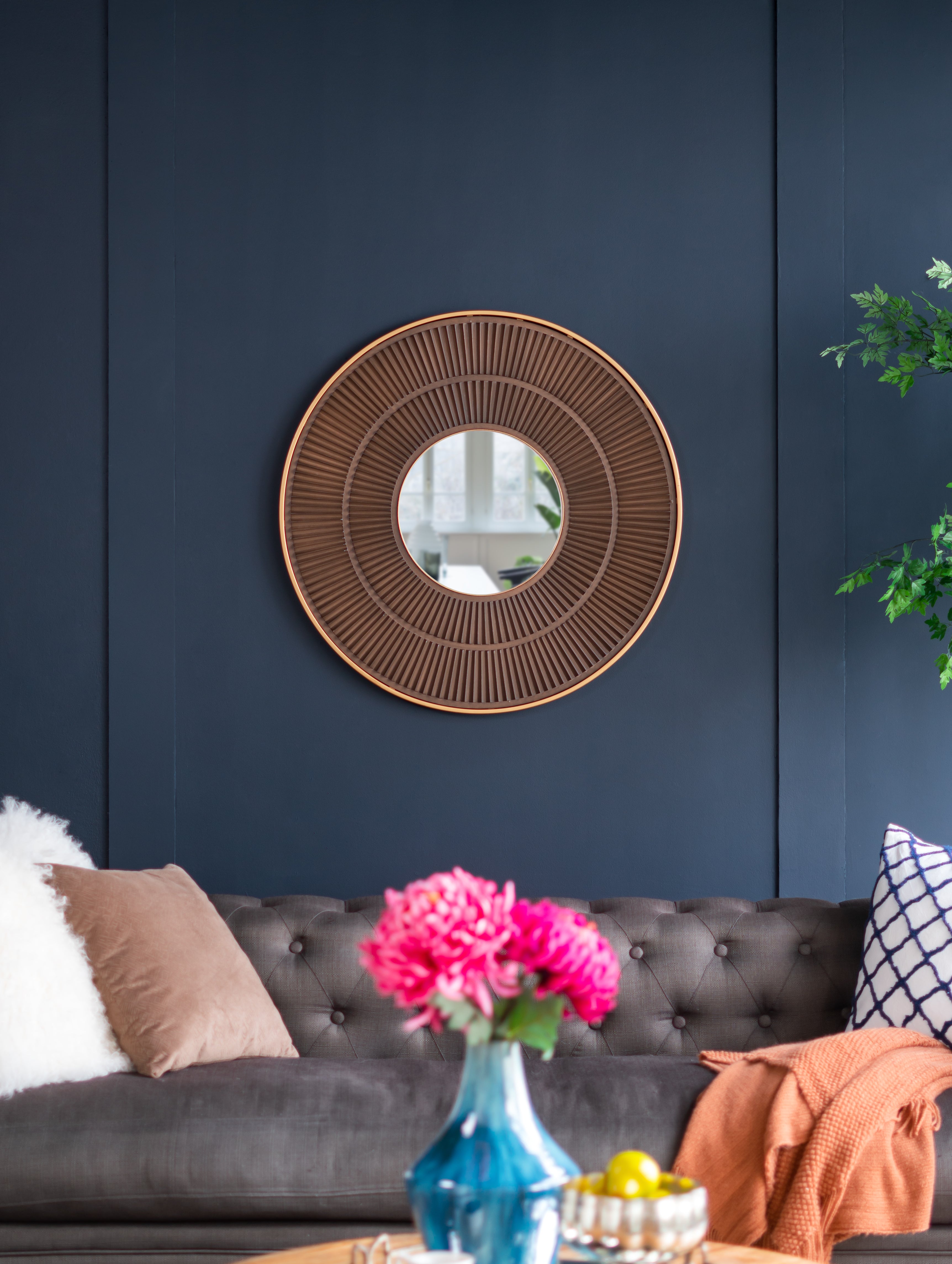 Round Wall Mirror with Pleated Design and Iron Frame