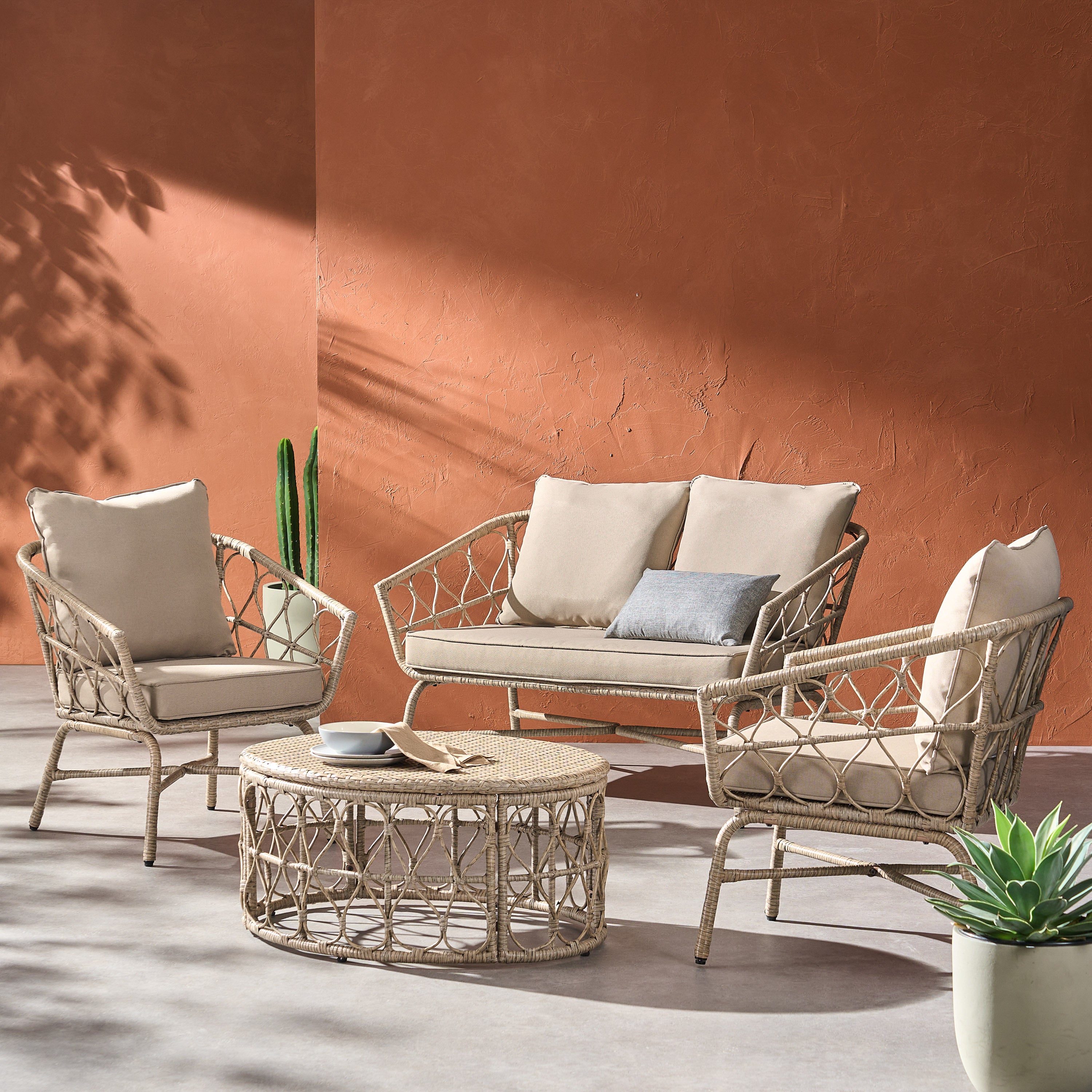4-Piece Outdoor Rattan Chat Set with Coffee Table, Loveseat and 2 Sloped Arm Chairs