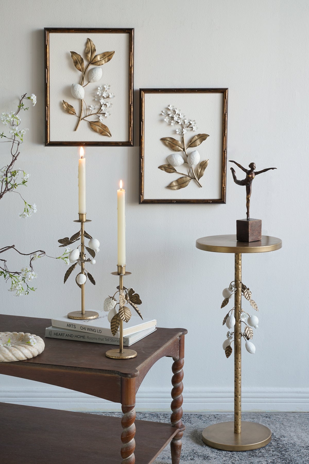 Round Iron Side Table with Gold and White Floral Accents and Cement Base