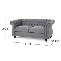 Quixotic Chesterfield Tufted Loveseat with Scroll Arms and Turned Legs